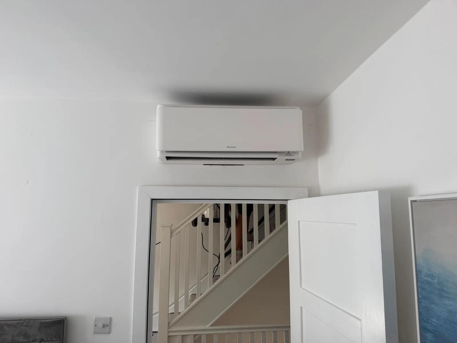 Daikin wall-mounted AC unit in a residential living room