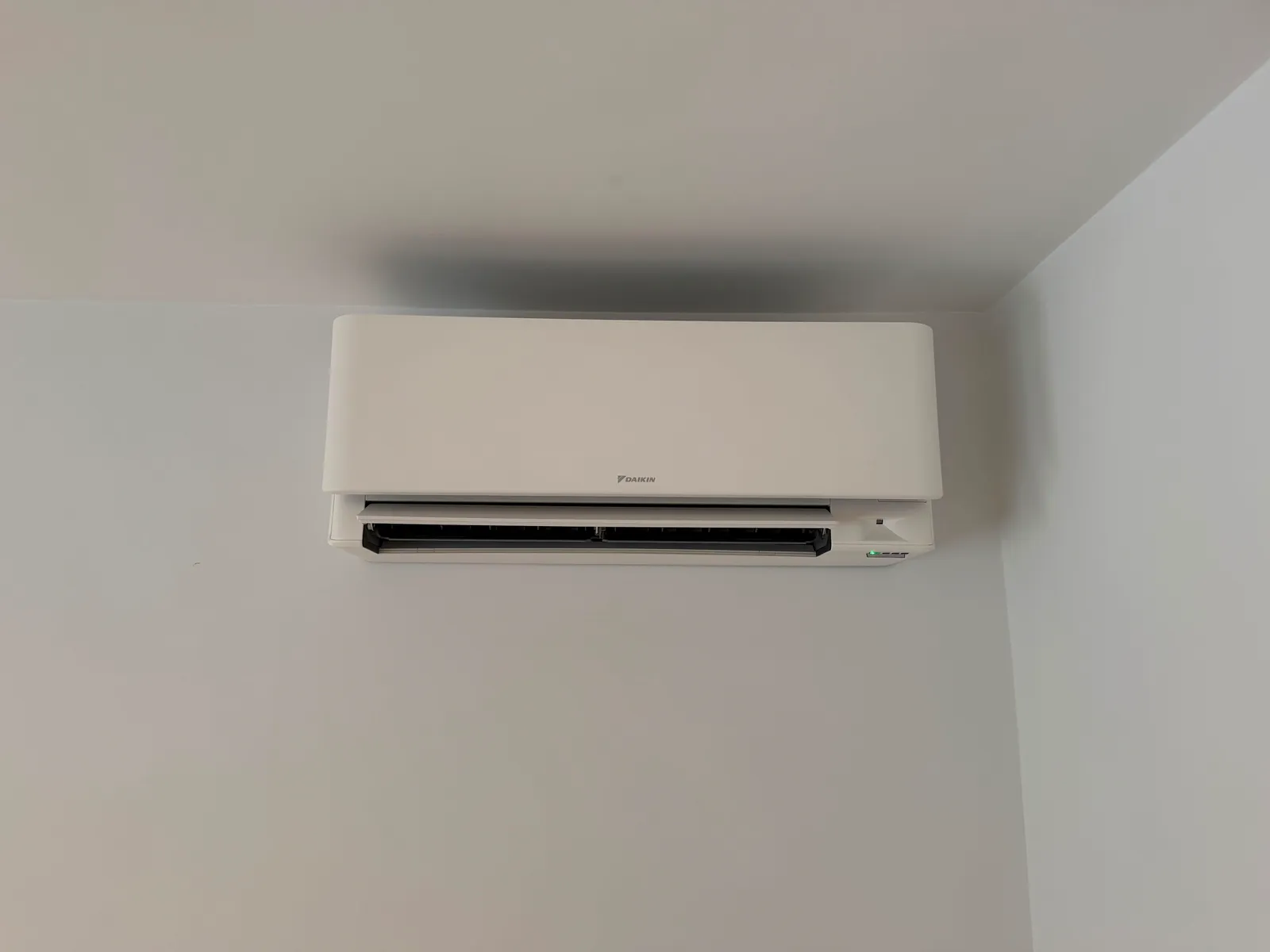 Daikin wall-mounted AC unit in a bedroom