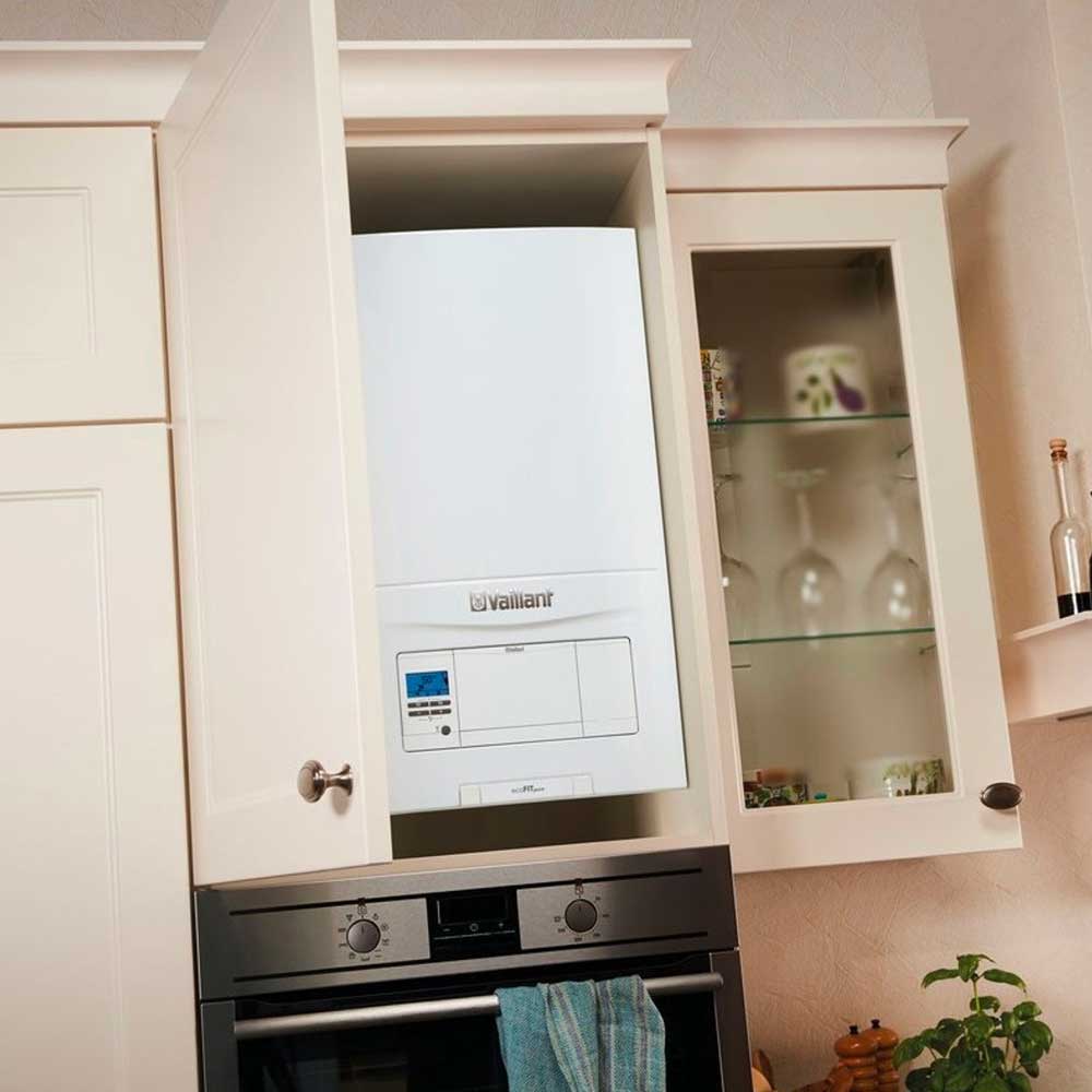 Vaillant ecoFIT pure residential boiler installed in a kitchen cupboard